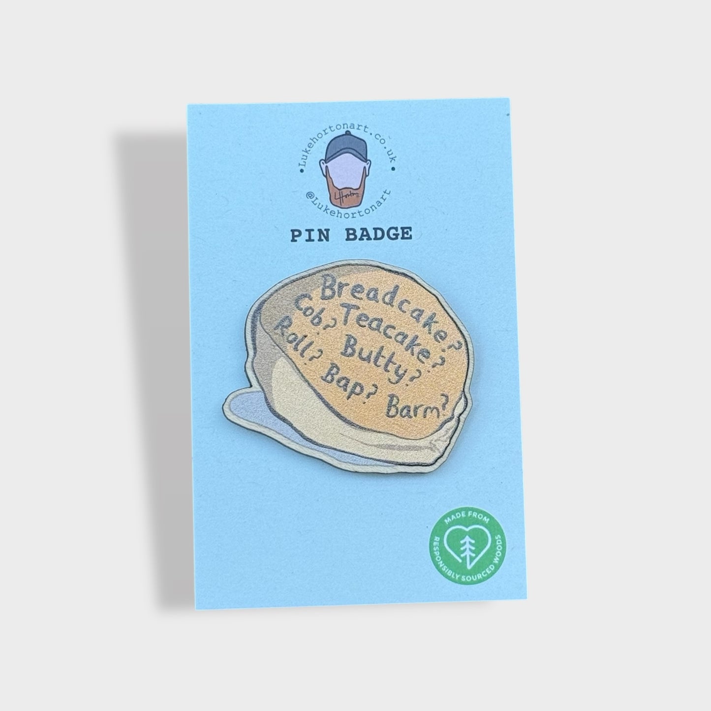Breadcake? - ECO Pin Badge - LukeHorton Art